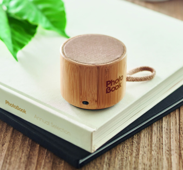 Logo trade promotional merchandise picture of: Round bamboo wireless speaker