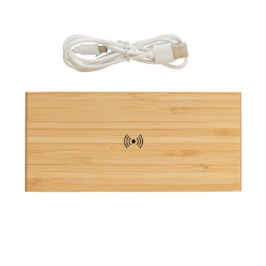Logotrade reklaamkingi foto: Bambusest äratuskell 5W juhtmevaba laadijaga