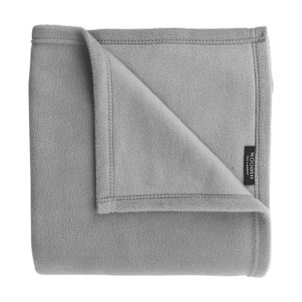 Logotrade firmakingituse foto: Wooosh Vida GRS taaskasutatud materjalist pleed